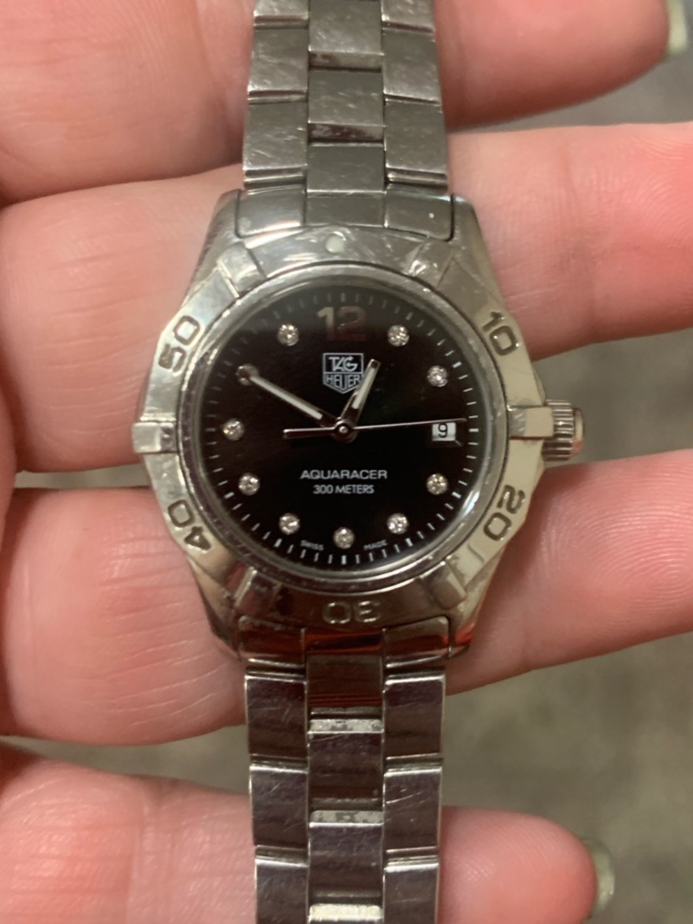 Tag Heuer Aquaracer Diving Watch with a black dial and diamond detailing - Picture 8 of 13